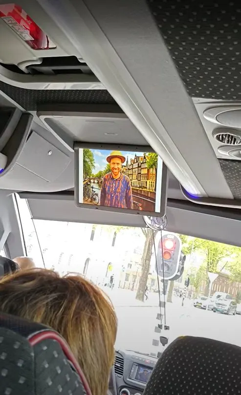 The Cartoon Van Gogh Character in our Tempo traveller, explaining everything like a human guide during the trip!